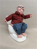 Novelty, toy man, sitting on toilet battery