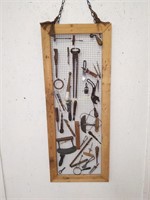 antique tool and utensil display board