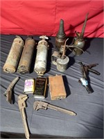 Old fire extinguishers, oil, cans, miscellaneous
