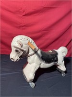 Vintage plastic roller horse toy