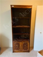 bookcase with 2 doors at the bottom