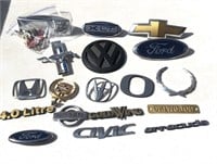 Lot of Vehicle Emblems & Mercedes Cologne Can
