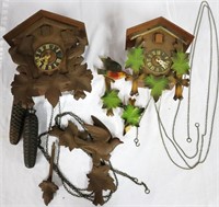 Pair of German Carved Wood Cuckoo Clocks