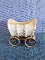 Decorative resin covered wagon planter with cast