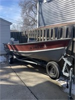 Lund 16 ft bass boat with a 25 Johnson outboard