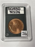 Richard Nixon copper coin coinworld case