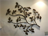 Two metal wall sculptures