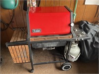 Red Weber Grill with tank & tools