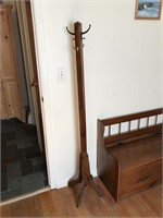 Antique oak clothes tree 65 inches tall.