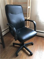 Office arm chair on casters