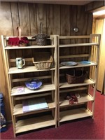 Two wooden shelves with miscellaneous items on