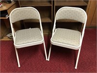 Two Samsonite folding padded chairs