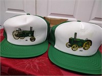 Two antique John Deere tractor hats