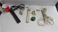 Lot of adapters, surge protectors, and extension
