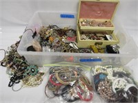 SIZABLE CONTAINER OF COSTUME JEWELRY: