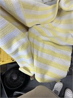 large yellow and white crochet blanket