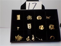 12 BROOCHES