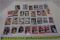 30 Assorted Sports Cards in Sleeves