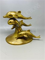 brass dolphin statue - Dolbi Cashier Creative