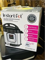 Insta Pot cooker in box - never used