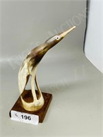 9" tall carved bone bird
