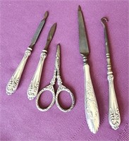 Victorian utensils with sterling silver handles