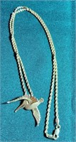 10kt gold rope chain with pelican charm approx 24