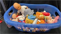 Clothes basket of toys