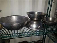 Four steel bowls