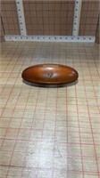 Wooden Redskins football with pen