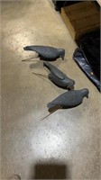 Three crow decoys
