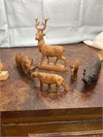 Large lot of hand carved animals all but 2 come