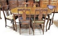 Country French Style Table with Mismatched Chairs.