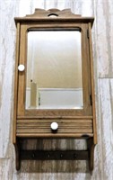 Beveled Mirrored Oak Medicine Cabinet.