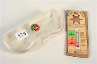 B-A EYE GLASS CASE AND CARDBOARD THERMOMETER
