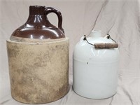 2 stoneware jugs.  Tan and brown 13" tall.  White