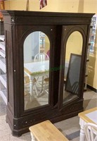 Large antique armoire w/two door front, mirrored