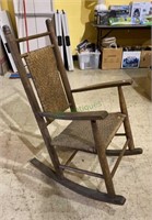 Nice vintage arm chair rocker with cane seat and