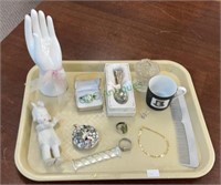Tray lot includes three rings, a baby spoon,