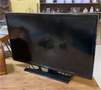 Samsung brand 32 inch flat screen TV with stand
