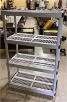 Four tier plastic shelf rack measures 55 x 36 x