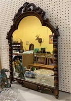 Beautiful antique mirror with carved wood