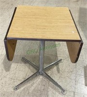 Small drop leaf table with steel base and butcher