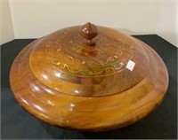 Beautiful wooden carved bowl with gold appliqué