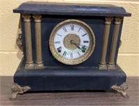 Antique mantle clock with Grecian style pillars,