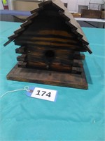 Wood bird house   approximately 11\" high 13 long