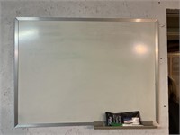 Whiteboard with markers.