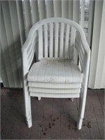 Four Plastic Patio Chairs - Needs Cleaned