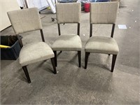 3 cushioned chairs with wood frame