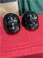 2 motorcycle helmets
